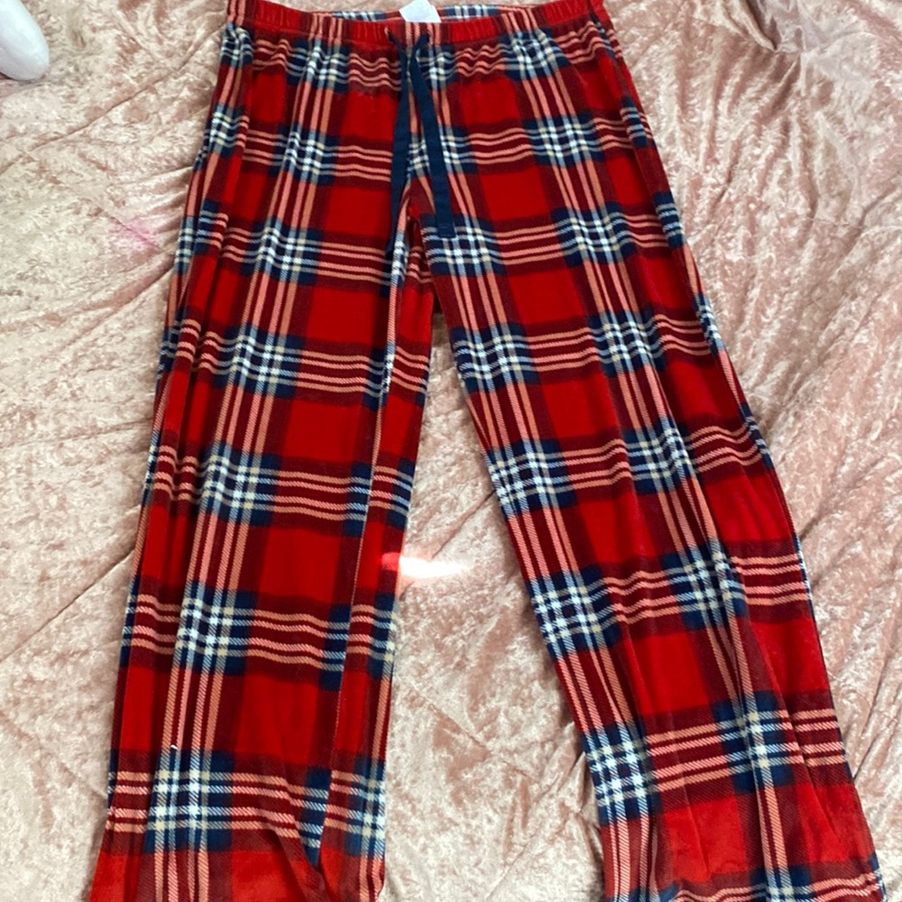 Hello I am selling pajama were size medium colors Red white and blue